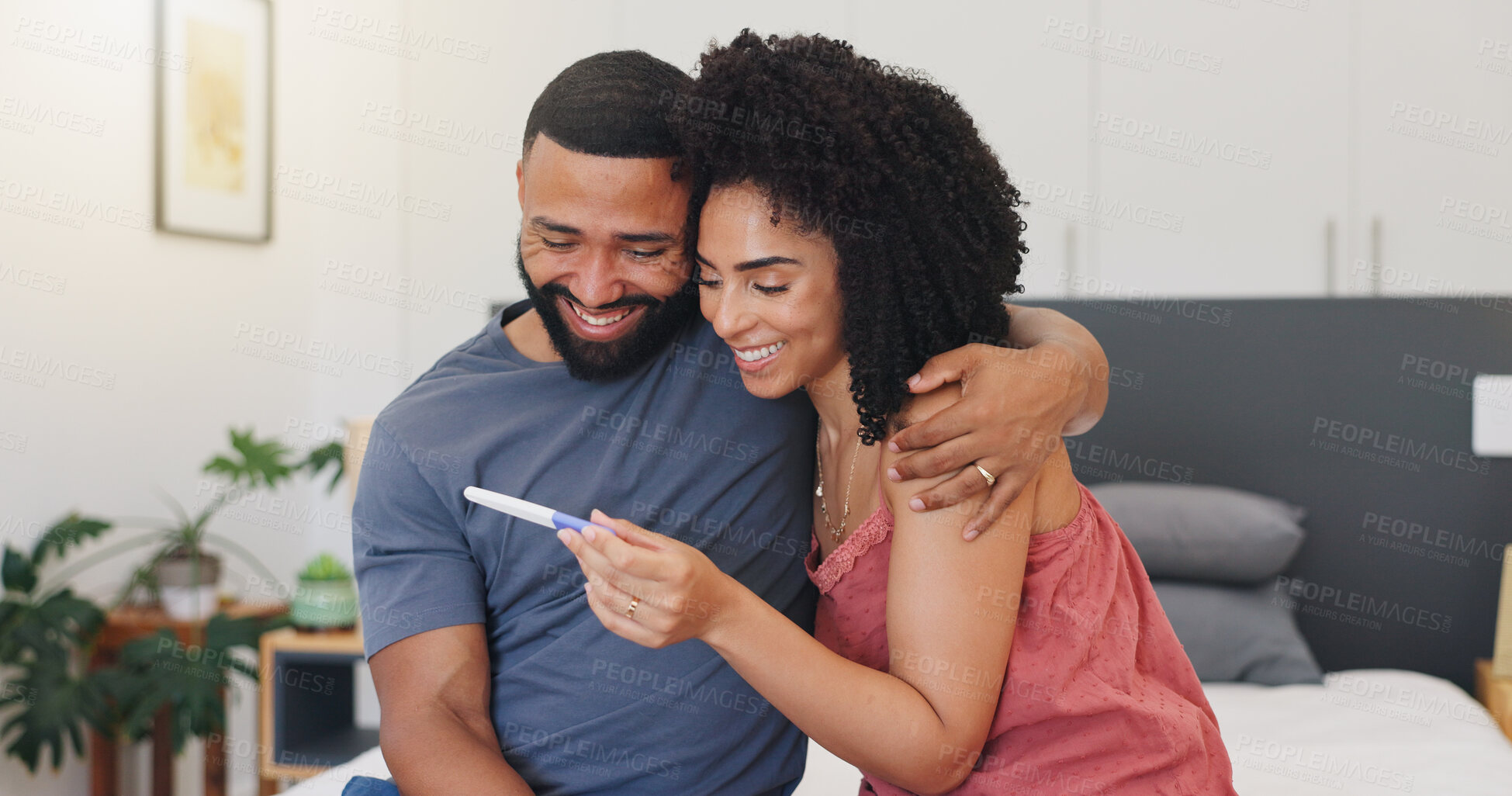 Buy stock photo Smile, couple and hug with pregnancy test at house of positive result, good news and IVF success. Happy, people and embrace for fertility kit, family planning and pregnant announcement of future baby