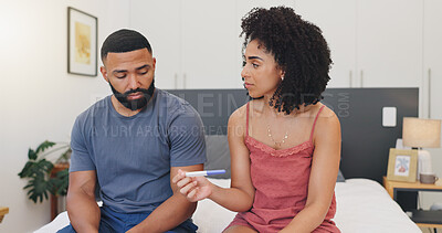 Buy stock photo Frustrated couple, pregnancy test or disagreement with stress for mistake in bedroom or home. Nervous man, woman or worry with maternity stick or results for concern or unplanned fertility in house