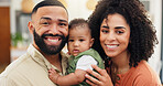 Parents, baby and happy with portrait, home and connection with hug with love in living room. People, mother and father with infant child, care and smile with embrace at family house in Costa Rica