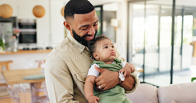 Buy stock photo Happy, carry and dad with baby on sofa for bonding, loving relationship and development on weekend. Family, home and father holding child for safety, support and affection in living room together
