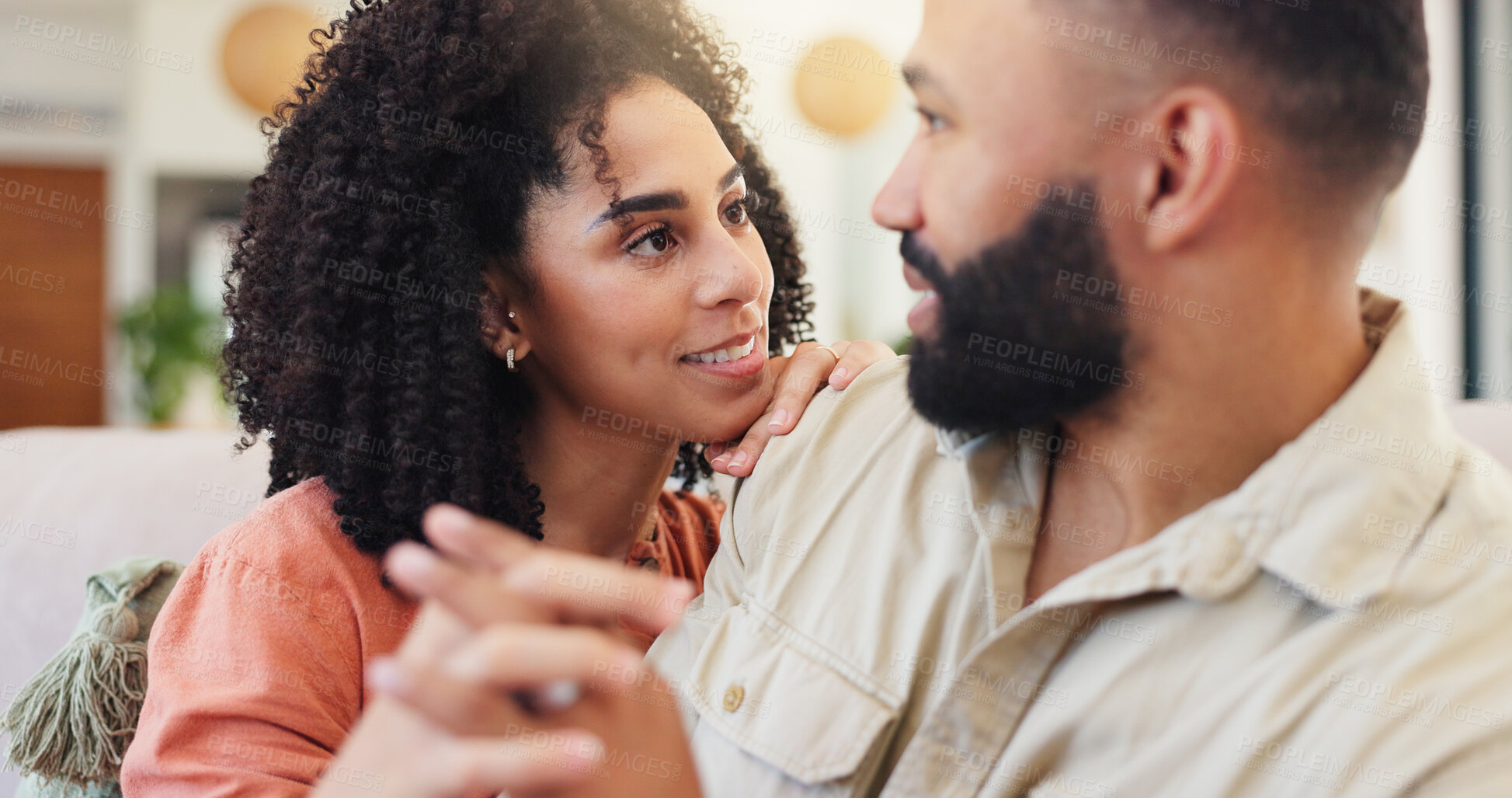 Buy stock photo Hug, couple and bonding in lounge, affection or romance in home, smile or relax on weekend or break. Happy, man and woman in living room, embrace and free time in house, relationship or holding hands