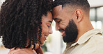 Love, connection and couple with forehead touch in home for affection, security or bonding together. Happy, people and trust in marriage with protection, commitment and healthy relationship in house