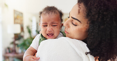 Buy stock photo Home, mother and comfort crying baby with attention, hungry and discomfort with teething. Single mom, people and console sick infant in living room with motherhood, child development and connection