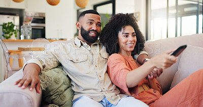 Buy stock photo Happy couple, relax and watching tv with remote on sofa for movie, series or change channel in home. Man, woman or hug with comfort for news, subscription or online entertainment together in house