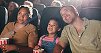 Family movie, theatre and child with popcorn in cinema for entertainment, experience and watching cartoon. Happy, parents and girl with snacks for screening, animation or film audience for production