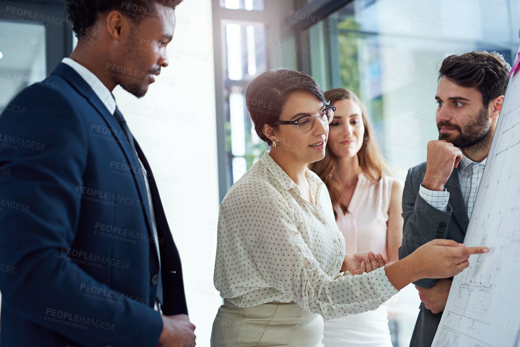 Buy stock photo Team, whiteboard and discussion in workplace for collaboration, strategy meeting and design plan. Teamwork, employees and blueprint in architecture office with brainstorming and project development