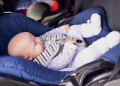 Buy stock photo Infant, baby and travel in car seat for adventure with safety or support for road trip on vacation or holiday on weekend. Child, boy and relax or sleep on chair for protection on journey with family