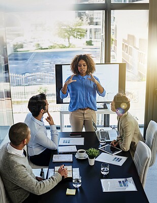 Buy stock photo Black woman, coach and discussion with team in meeting, presentation or conference on project at office. Female person or speaker talking to employees with paperwork, documents or ideas at workplace