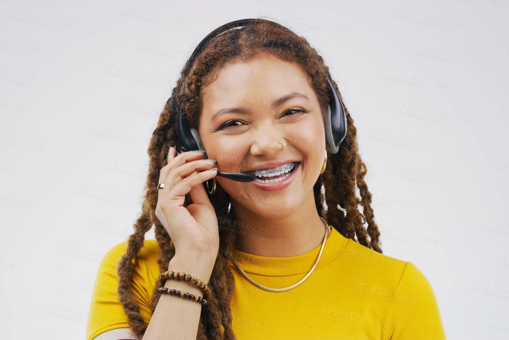 Buy stock photo Portrait, woman and headset for call centre, virtual assistant and communication with smile. Gen z, female person and microphone for pride, talking and crm agent for happy consultant in studio 