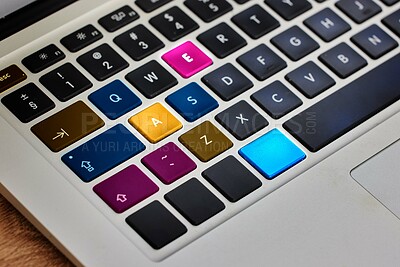Buy stock photo Laptop, keyboard button and color tech in closeup on internet, website or information on table. Digital, computer and electronic pc on desk for work, email or networking in futuristic key or hardware