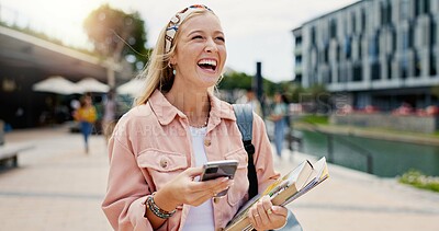 Buy stock photo Laughing, learning and phone with student woman on campus of college or university for education. Books, funny and thinking with happy person outdoor at school for growth, scholarship or study