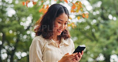 Buy stock photo Japanese woman, smile and phone outdoor of travel location, communication and directions translation. Happy, person and mobile of chatting, research and information of morning commute in Japan nature