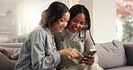 Online, friends and girls with smartphone, lounge and laughing at gossip on social media and bonding. Pointing, smile and people with mobile for funny news on post, living room and together in house