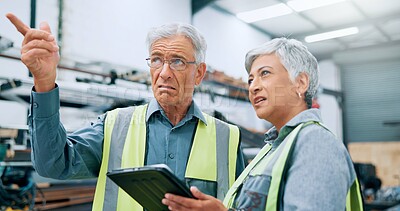Buy stock photo People, engineer and pointing with tablet at factory for planning, supply chain and inventory management. Mature staff, team and digital for manufacturing, logistics feedback and production checklist