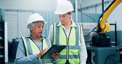 Buy stock photo Women, robotics and meeting in lab, tablet and conversation with software update. Employees, engineering and people in warehouse, tech and inspection with digital app, design review or cooperation