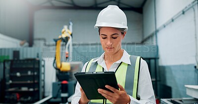 Buy stock photo Woman, technician and tablet at robotics factory for research, machine update and technical guide. Female engineer, digital and production manual, automation safety and information for manufacturing