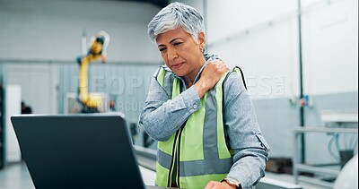 Buy stock photo Robotics, shoulder pain and woman in factory, laptop and muscle tension with burnout. Mature person, engineering and employee in warehouse, computer and joint injury with inflammation and bruise