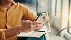 Phone, notebook and hands of man in home for finance journal, planning or investment information. Cellphone, diary and male person with research for online banking on mobile app in apartment.