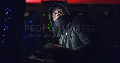 Buy stock photo Night, scared and man on laptop for hacking, programming or cybersecurity website. Software attack, late or hacker with mask in dark room for big data research, cybercrime or online scam operation