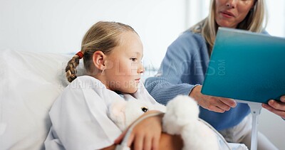 Buy stock photo Mom, sick kid and reading book in hospital for support, love and fantasy in medical visit. Single parent, girl and woman storytelling in clinic for kindness, comfort or patient in rehabilitation care