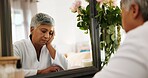 Fatigue, senior woman and sleeping in bedroom for peace, afternoon nap and dreaming at vanity. Tired, elderly person and mirror reflection for exhaustion, weekend burnout and asleep for rest at house