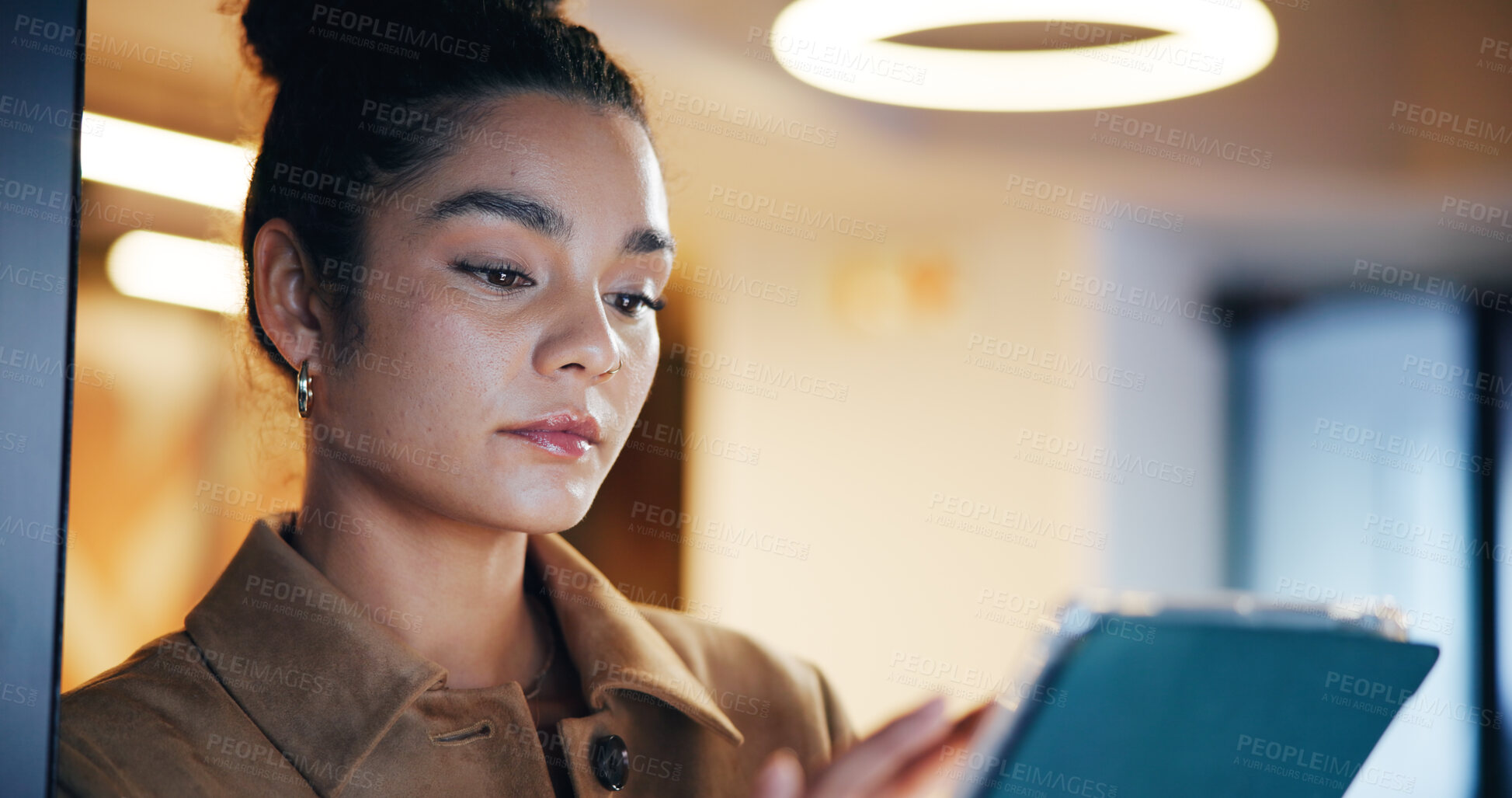 Buy stock photo Business woman, tablet and scroll at night, office and time management for deadline at media startup. Person, tech and dark workplace with application, feedback and review project at digital agency
