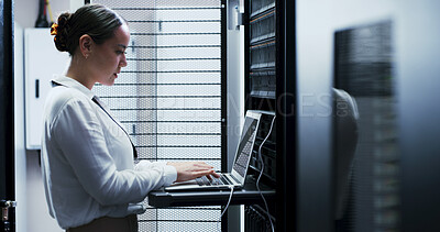 Buy stock photo Laptop, typing and woman in server room for cybersecurity, network maintenance or programming. Administration, computer and firewall installation with IT professional in data center for engineering
