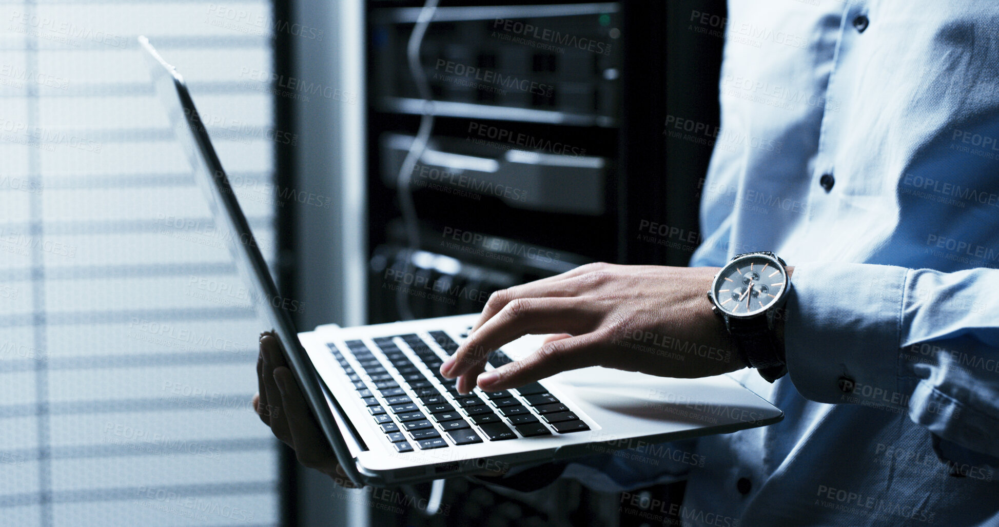 Buy stock photo Hands, typing and laptop with programming in server room, coding or IT solution at company. Person, cybersecurity and assessment with computer, hardware or information technology for system upgrade