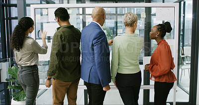 Buy stock photo Group, teamwork and planning in office, glass and discussion for ad campaign, back or brainstorming. Talking, people and marketing strategy with sticky notes, meeting and collaboration with research