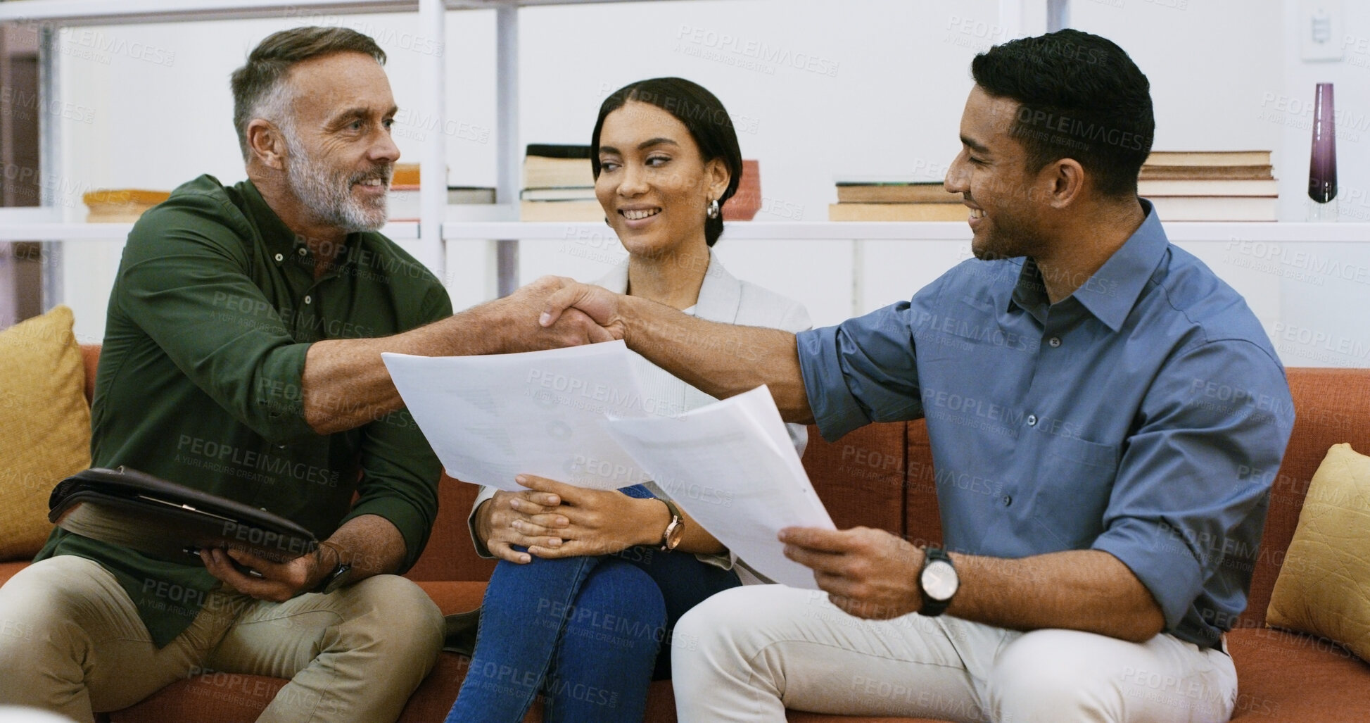 Buy stock photo Happy, business people and handshake with documents in office for contract or project agreement. Employees, colleagues or shaking hands with paperwork for deal, collaboration or teamwork in workplace