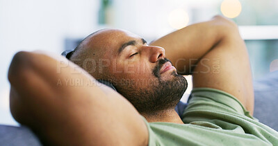 Buy stock photo Headphones, relax and man on sofa in home listening to podcast, music or calm playlist. Sleeping, audio tech and male person streaming album for afternoon nap on couch in living room at apartment.