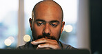 Laptop, night and man in office for reading error, research or troubleshooting solution. Programmer, late and developer with PC glitch on technology for thinking, problem solving or online review