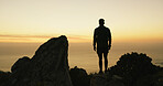 Man, fitness and silhouette with ocean view on mountain for hiking, exercise or outdoor journey. Back, active or male person with cliff for trekking adventure, stop or physical activity on space
