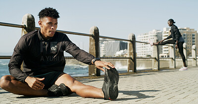 Buy stock photo Man, fitness and stretching with leg for warm up or flexibility on outdoor promenade. Active, male person or runner with workout preparation or foot for physical exercise or training on sidewalk