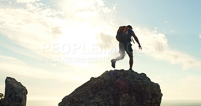 Buy stock photo Rock, hiking and travel with man in nature for trekking, adventure and summer vacation. Explore, backpacking and mountain summit with person on cliff outdoor for sunrise, freedom and tourism space