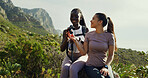 Smile, people and friends with binocular for hiking, nature sightseeing and mountain view. Happy, women and relax for travel, backpacking adventure and birdwatching observation with wildlife search 