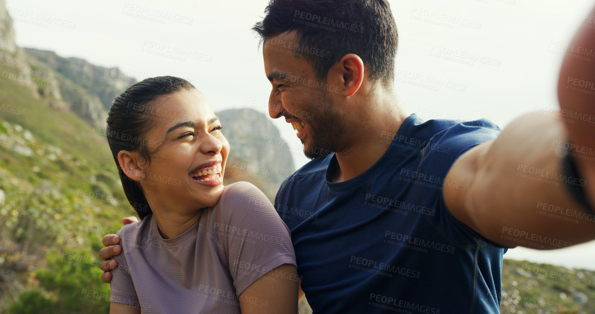 Buy stock photo Couple, selfie and smile for hiking on mountain, hug and laugh with live stream for adventure in nature. Happy woman, man and photography for memory, care or social media for trekking in Colombia