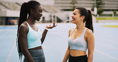 Buy stock photo Talking, women and athlete on track for break, exercise or fitness for laughing or teamwork. Relax, runners and happy people in stadium for sports training with joke, conversation or healthy friends