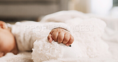 Buy stock photo Hand, baby and sleeping with plushy toy, bed and comfort for rest, growth and wellness at home. Child, infant and tired with soft sheep doll, calm or exhausted with dreaming in nursery at house