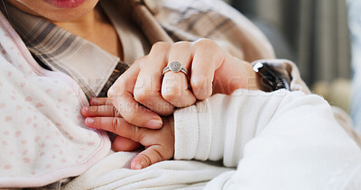 Buy stock photo Family, love and mother with baby for holding hands, healthy relationship and childcare in home. Kid, childhood and mom in living room with hug, care and relax together for affection and support