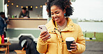 Happy, food truck and woman with phone and coffee on social media, internet and website on weekend. Customer review, outdoor and person on smartphone with drink by mobile cafe, restaurant and vendor
