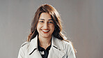 Happy, professional and portrait of businesswoman in studio with confidence for career development. Smile, male person and female financial advisor from Brazil with pride for job by gray background.