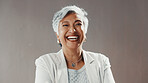 Laugh, professional and portrait of businesswoman in studio with confidence for career development. Happy, female person and mature financial advisor from Mexico with pride by gray background.