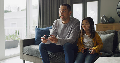 Buy stock photo Father, kid and play video game in home for competition, contest and entertainment on sofa. Happy dad, girl and child with console to challenge parent, hobby and relax together with family in lounge