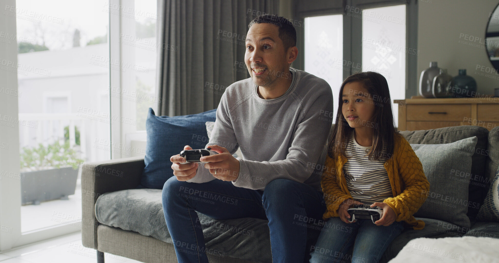 Buy stock photo Father, kid and play video game in home for competition, contest and entertainment on sofa. Happy dad, girl and child with console to challenge parent, hobby and relax together with family in lounge