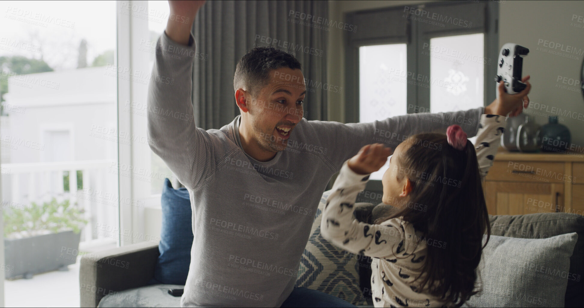 Buy stock photo Winning, video game and father with child in home cheering with energy, bonding or happiness for fun. Smile, excited and dad with girl kid for celebration with online gaming with controller in house.