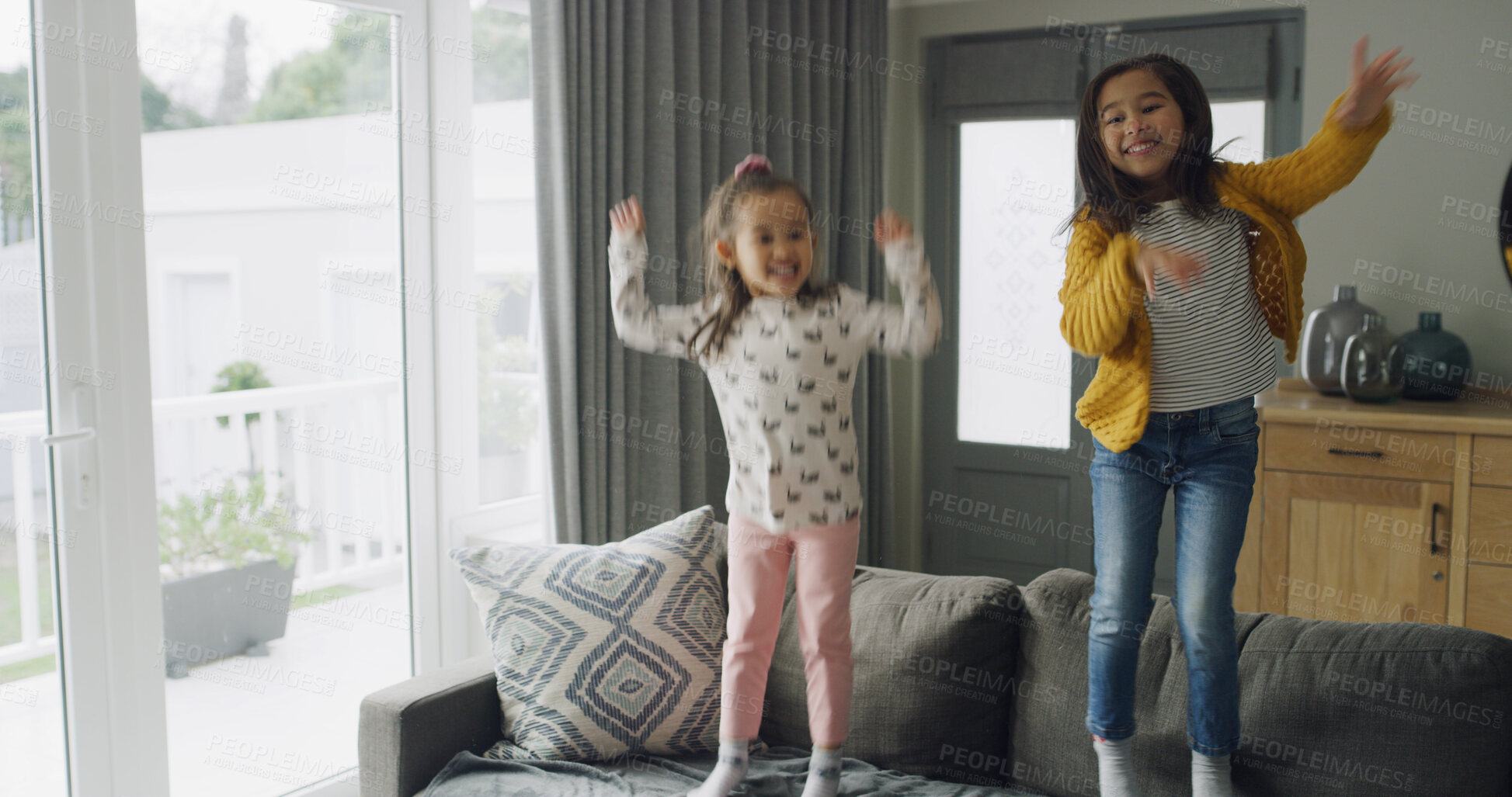 Buy stock photo Jumping, game and ADHD with kids on sofa for hyperactivity, playful and bonding. Sensory stimulation, dancing and entertainment with children in living room of home for fun and energy together