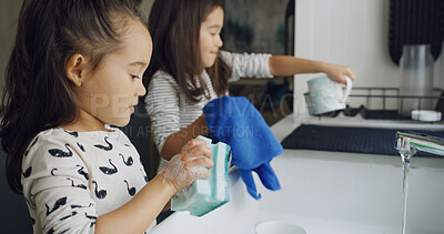 Buy stock photo Cleaning, washing dishes and support with kids in kitchen for hygiene, help or domestic chores. Bacteria prevention, sanitary or housekeeping with siblings or children in family home for maintenance