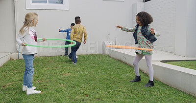 Buy stock photo Friends, children and play with hoop in garden for fun, activity and nature in backyard. Girls, together and bonding with plastic ring, outdoor and smile for summer break with toys for game or dance