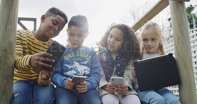 Buy stock photo Friends, kids and smile with technology in park for social media, fun and break in backyard. Children, together and bonding with phone, tablet and internet for holiday in playground for games or meme